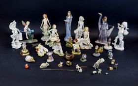 A Large Collection Of Mythical Resin Figurines Approx 32 items in total to include several faries,