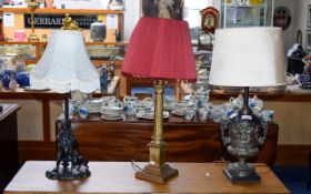 A Collection Of Table Lamps Three contemporary reproduction lamps, to include one with resin base in