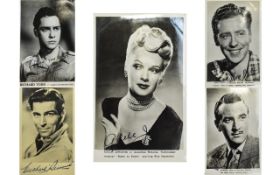 A Collection of Famous Film Stars Hand Signed - Black and White ( Gloss ) Photos - From The