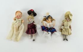 A Collection Of Antique Bisque Miniature Dolls Four in total,