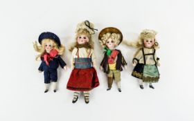 A Collection Of Victorian Miniature Antique Bisque Dolls Four in total,