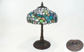 Tiffany Style Table Lamp, Leaded Shade, Embossed Cast Base Depicting Dragonflies.