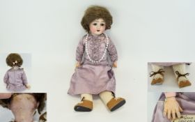 Otto Gans of Waltershausen - Germany - Bisque Head and Composition Fully Jointed Baby Doll.