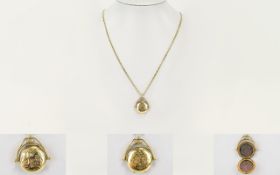 A Nice Quality 9ct Gold Swivel Hinged Round Locket with Attached 14ct Gold Fancy Chain.