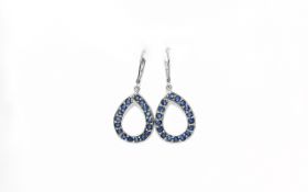 Sapphire Loop Drop Earrings, single rows of round cut sapphires set in a loop shape, suspended
