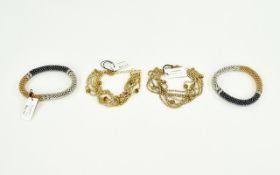 A Collection Of Four Bead And Stone Set Bracelets Four in total to include two gold, black and