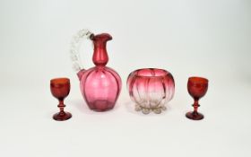 A Collection Of Cranberry Glass Four items in total to include two sherry glasses,