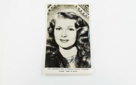 American Film Star Rita Hayworth Hand Signed Black and White Publicity Photograph.