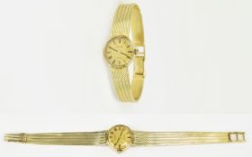 Ladies - Tissot 14ct Gold Quartz Wrist Watch with Integral 14ct Gold Mesh Bracelet.