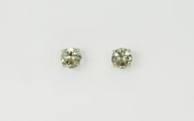 Pair of Green Amethyst Stud Earrings, each earring comprising a 3.5ct solitaire green amethyst,