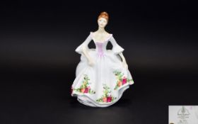 Royal Doulton Figure Country Rose HN. 3221, modelled by Peggy Davies, circa 1988. Height 21.6 cm.