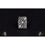 Antique Period Opal And Diamond Ring set in a gold and platinum. Not marked.