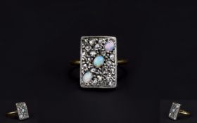 Antique Period Opal And Diamond Ring set in a gold and platinum. Not marked.