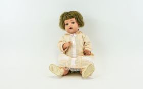 Early 20th Century Vintage German Doll Marked Schutz Marke above a heart to back of neck.