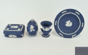 A Collection Of Wedgwood Portland Blue Jasperware Four items in total,