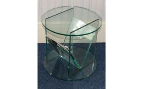 Small Glass Occasional Table With Integrated Magazine Rack Circular glass top and base with internal