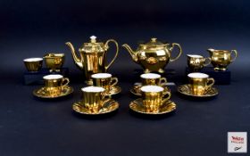 Wade Gilt Coffee Service Elegant coffee service comprising six espresso cups and saucers,