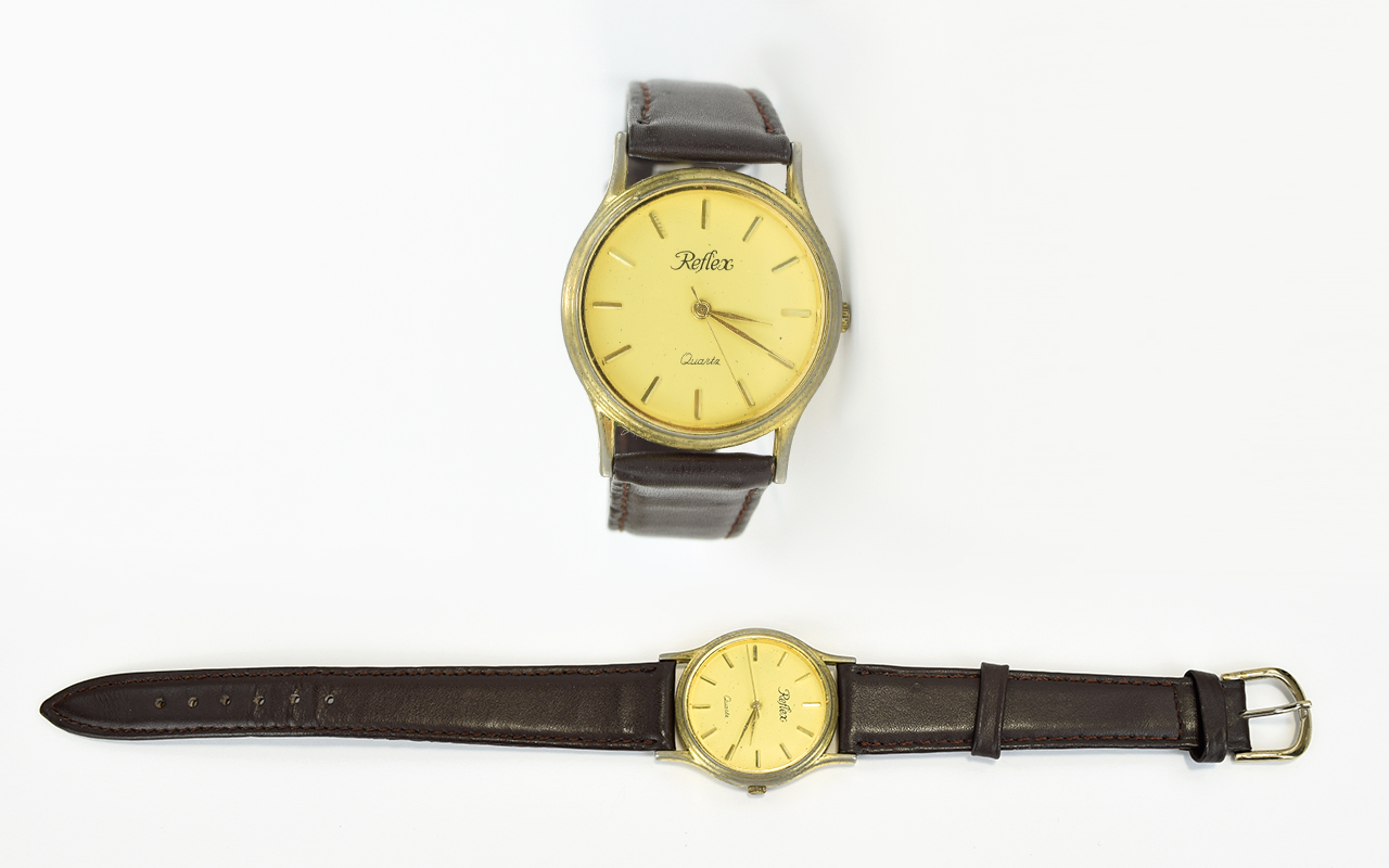 A Gents Reflex Wrist Watch In Case With