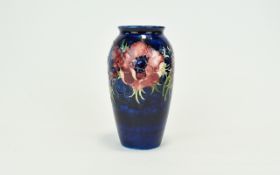 Moorcroft Tube lined Ovoid Shaped Vase ' Anemone ' Design on Cobalt Blue Ground.