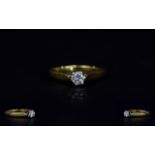 18ct Gold Set Single Stone Diamond Ring, The Round Brilliant Cut Diamond of Good Colour and Clarity.