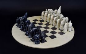 Stone Effect Chess Set with Oval Board and Traditional Chess Pieces.