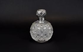 Victorian Silver Topped Globular Shaped Cut Glass Perfume Bottle with Star Base.