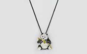 Enamel, Crystal and 'Cat's Eye' Panda Pendant or Brooch, a black and white enamelled, seated panda,
