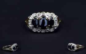Ladies 9ct Gold Set Sapphire and Diamond Dress Ring.