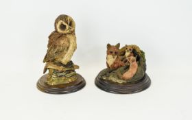 Country Artists Resin Wildlife Figures Two in total on circular wooden bases,