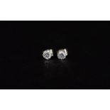 Pair Of Ladies 18ct White Gold Diamond Stud Earrings Each Set With A Round Modern Brilliant Cut