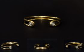 A Solid 9ct Yellow Gold Diamond Set Bangle From The 1960's / 1970's.