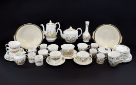 A Large Collection Of Aynsley Serve Ware Approx 44 items in total in 'Cottage Garden' pattern,