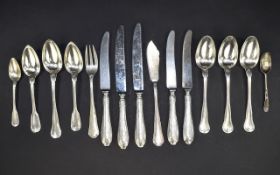A Collection Of Mixed Plated Cutlery 15 items in total, some with monogrammed handles.