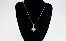 Diamond Cluster Pendant, a square of 16 close set, round cut diamonds, with a crenellated style