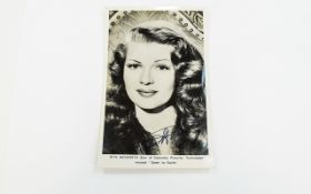 American Film Star Rita Hayworth Hand Signed Black and White Publicity Photograph. Signed In Ink,