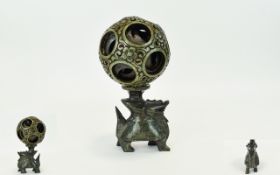 Chinese - Antique Spinach Jade and Metal Puzzle Ball, Raised on Spinach Jade.