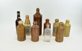 Collection Of Mostly Stoneware Advertising Bottles To Include John Baxter Ltd Waterfoot,