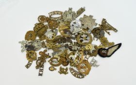 A Good Collection of English and American Regimental Military Cap Badges - Over 65 Badges In Total.