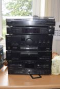 Technics Stereo HiFi System Black stereo with cassette deck, turntable, and super bass drive.