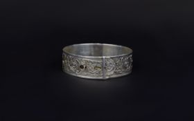 Charles Horner Silver Bangle In The Form Of A Belt With Chased Floral Decoration,