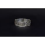 Charles Horner Silver Bangle In The Form Of A Belt With Chased Floral Decoration,