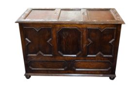 Large Antique Oak Coffer Bedbox/coffer in dark oak with carved fan shaped design top.