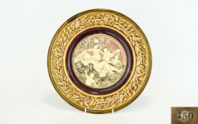 Glazed Earthenware Charger Mettlach style charger with raised central decoration depicting sleeping