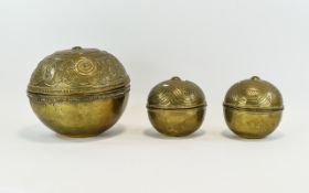 A Collection Of Decorative Hammered Brass Boxes three spherical boxes in anglo indian style with
