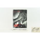 The Rolling Stones Autograph in book - Keith Richards