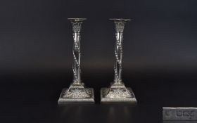 Victorian Period Pair of Classical / Ornate Silver Candlesticks, Raised on a Square Sloped Base,