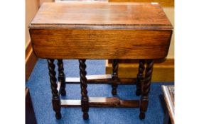 Oak Gate Leg Drop Leaf Table Small table with aged patina and barley twist legs.