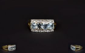 Ladies 9ct Gold Set Aquamarine and Diamond Dress Ring.