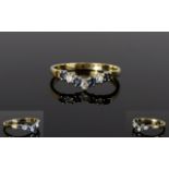 Ladies 9ct Gold Set Diamond and Sapphire Wishbone Shaped Dress Ring.