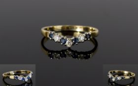 Ladies 9ct Gold Set Diamond and Sapphire Wishbone Shaped Dress Ring.